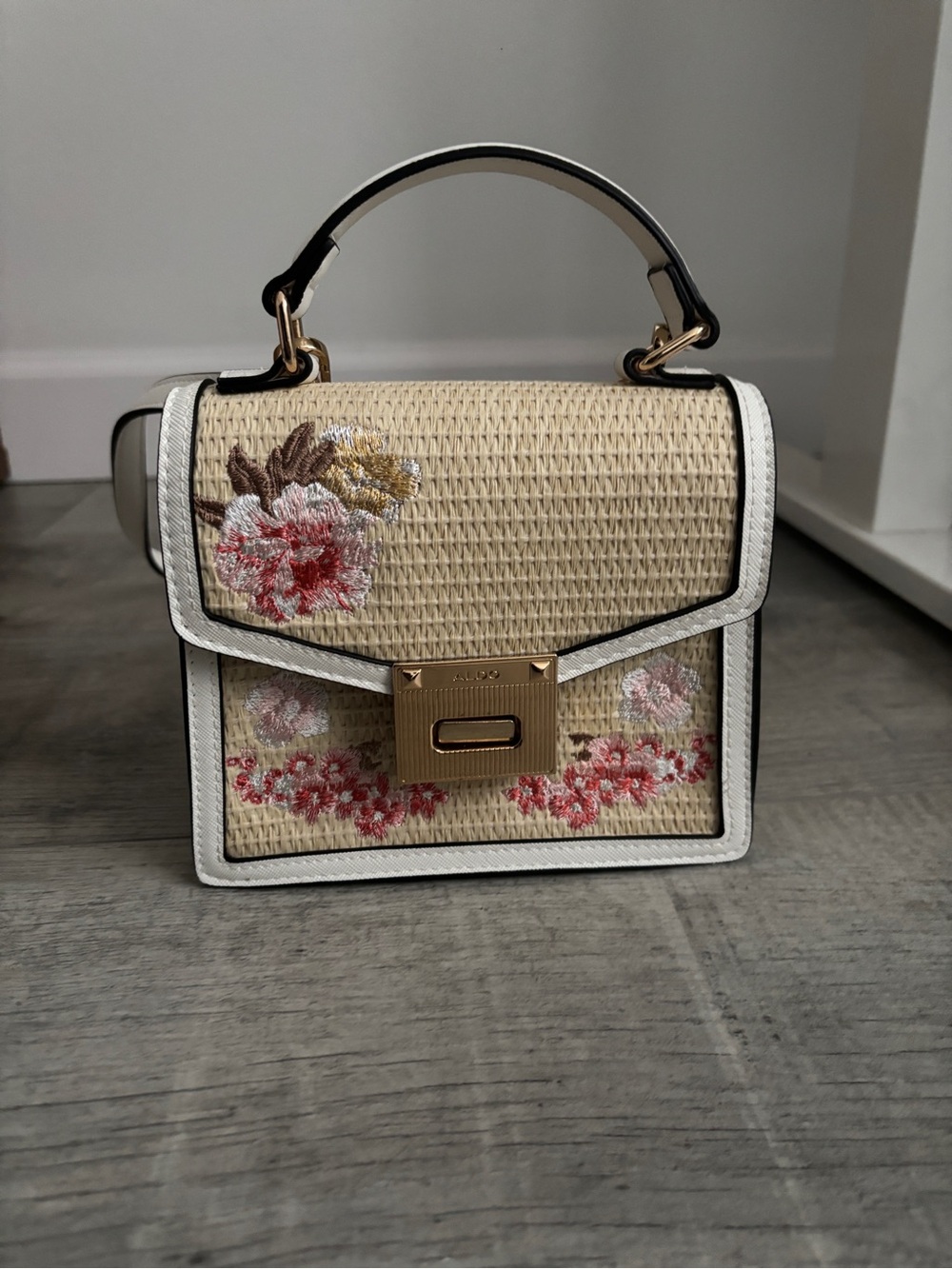 Aldo Beige Woven Crossbody with White Trim and Floral Embroidery